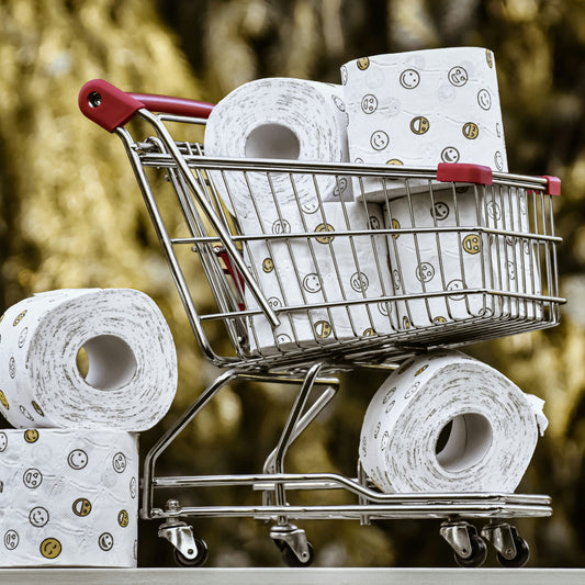 Shopping cart full of tissue and diapers